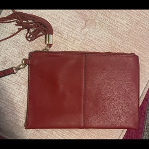 Brand. New large red wristlet purchased from Macy’s